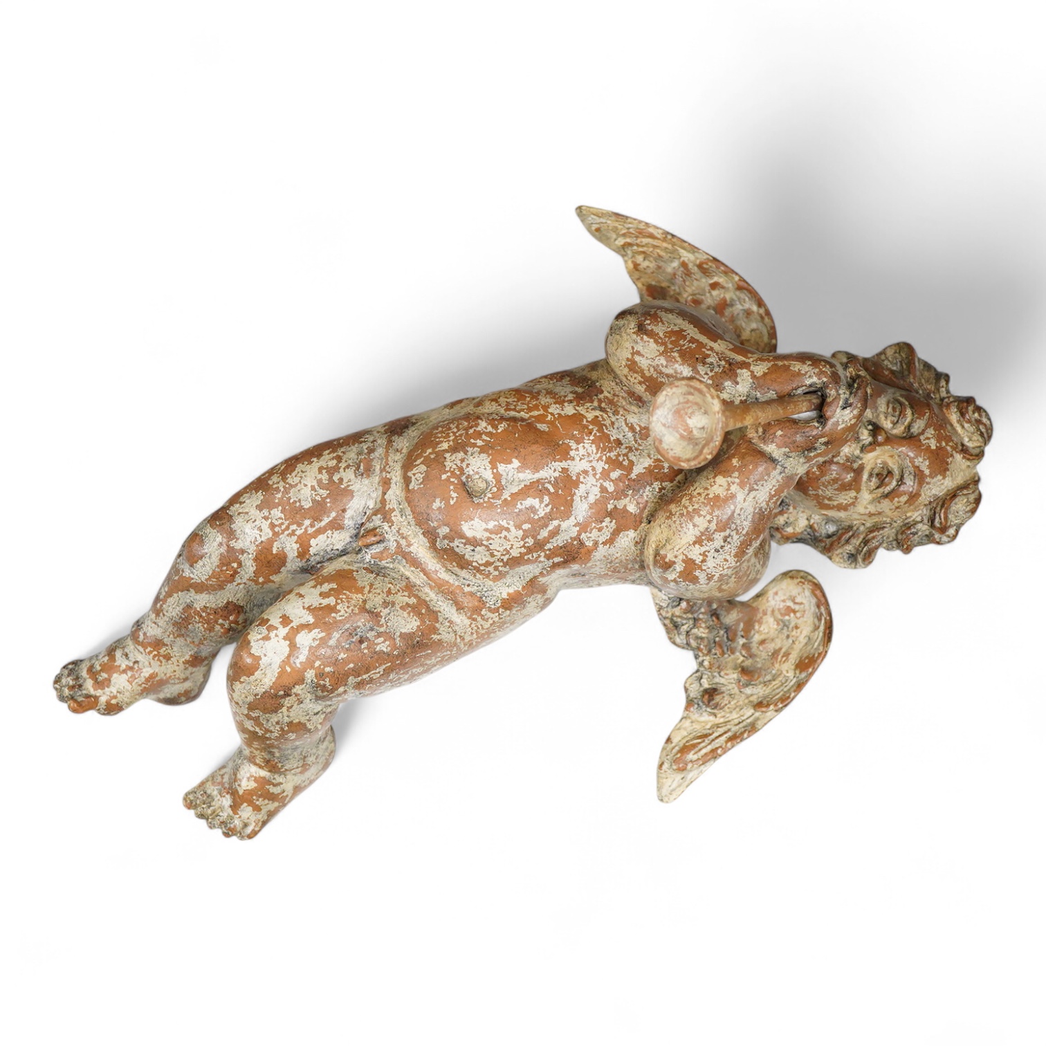 A decorative simulated gesso wall putti, in Baroque style, approximately 55cm high